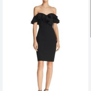 Sunset + Spring black bodycon cocktail dress.  Ruffled off the shoulder mini lit